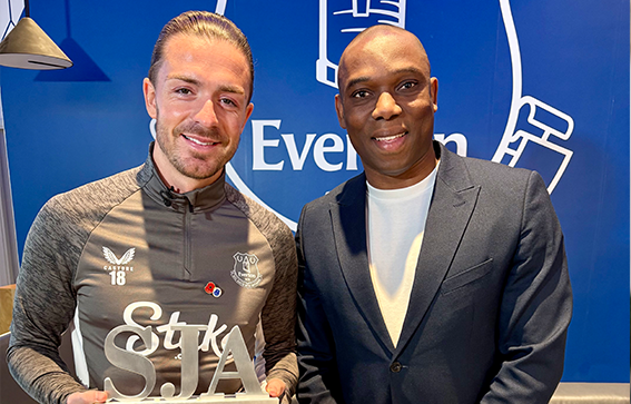 Jack Grealish and Samuel Okafor holding SJA Trophy